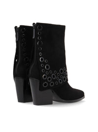 Botín solapa anillas negro