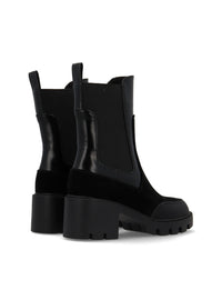 Botín chelsea track negro