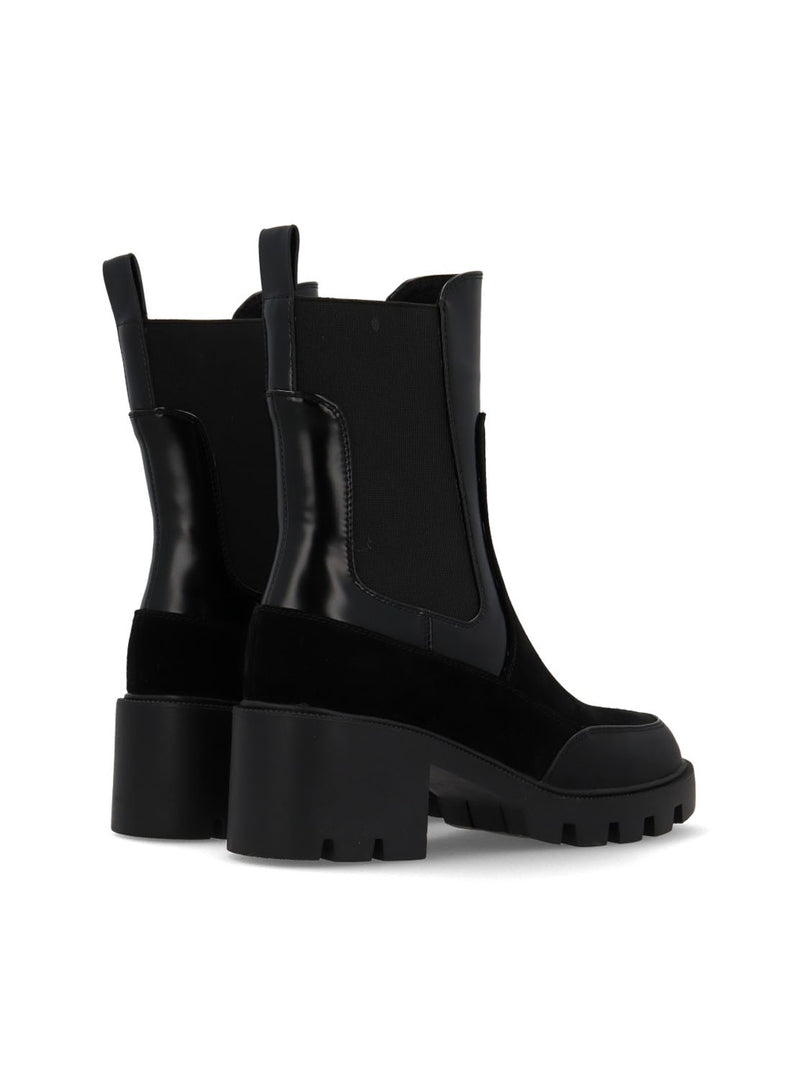 Botín chelsea track negro