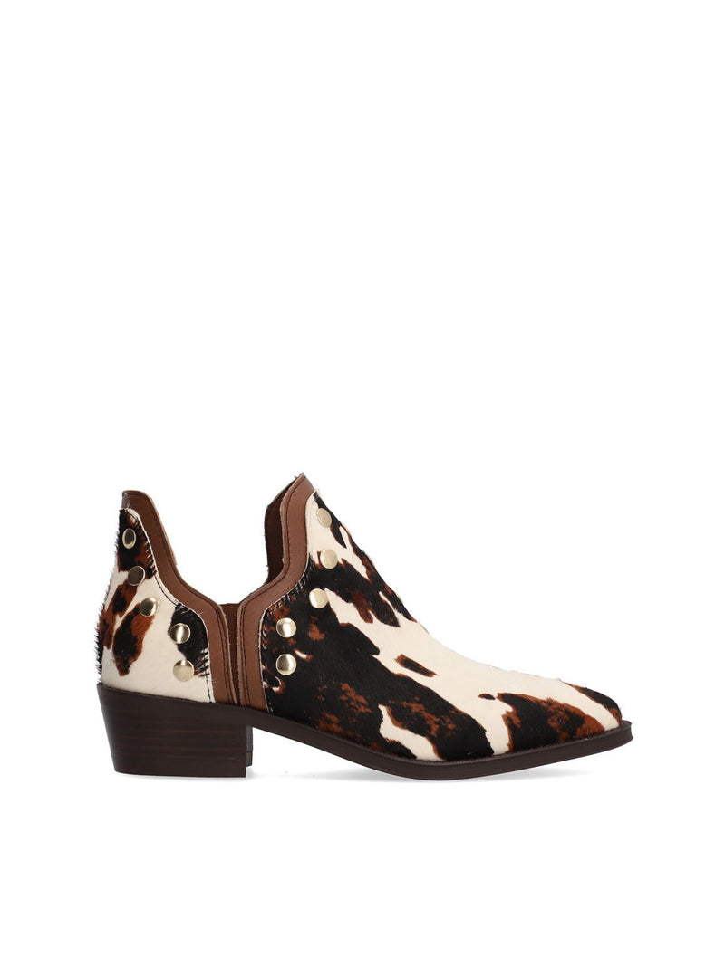 Botín tobillero tachuelas pelo animal print