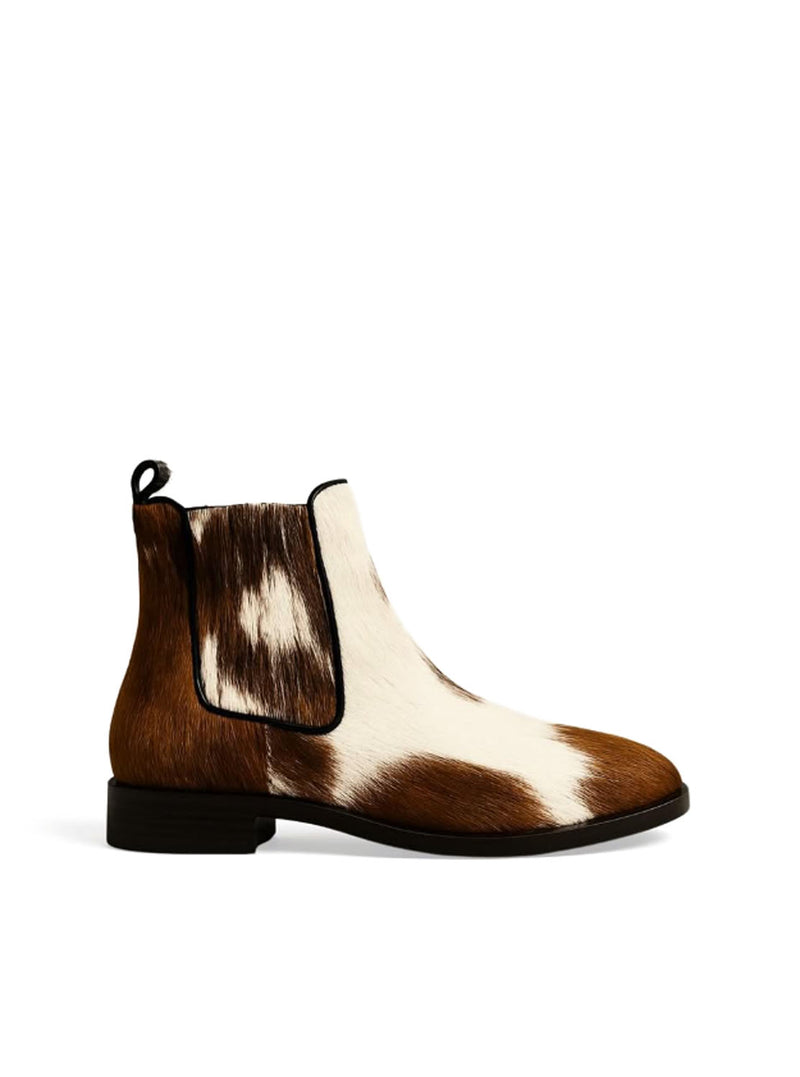 Botín chelsea pelo animal print
